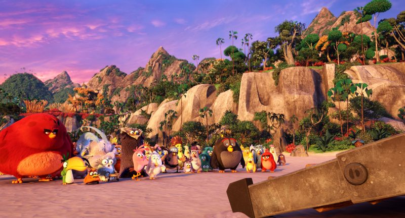 Concerned villagers, including Red (Jason Sudeikis), Chuck (Josh Gad), Bomb (Danny McBride), Matilda (Maya Rudolph), Stella (Kate McKinnon) and Judge Peckinpah (Keegan-Michael Key) gather on the beach in Columbia Pictures and Rovio Animation's ANGRY BIRDS.