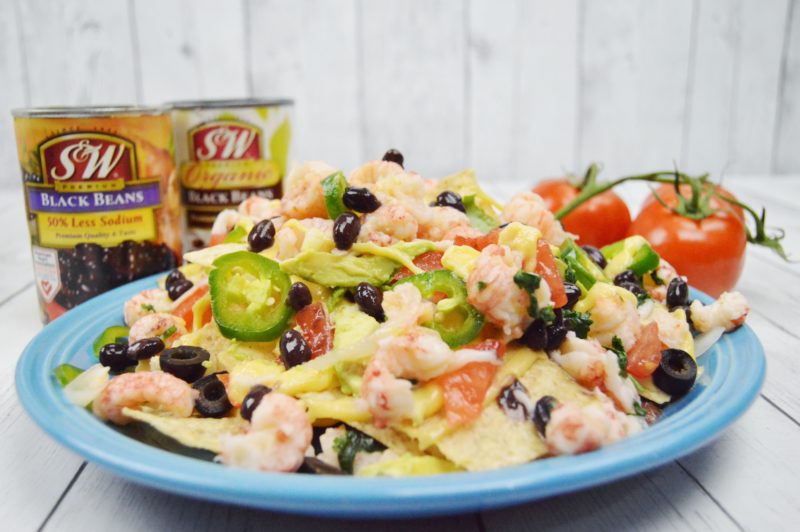 Do you love nachos? Try this fresh spin on this traditional recipe. Our Langoustine Lobster Nachos inspired but the Disneyland California Cove Bar Lobster Nachos using Organic S&W Black Beans. 